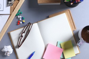 Designer's table with notes and tools
